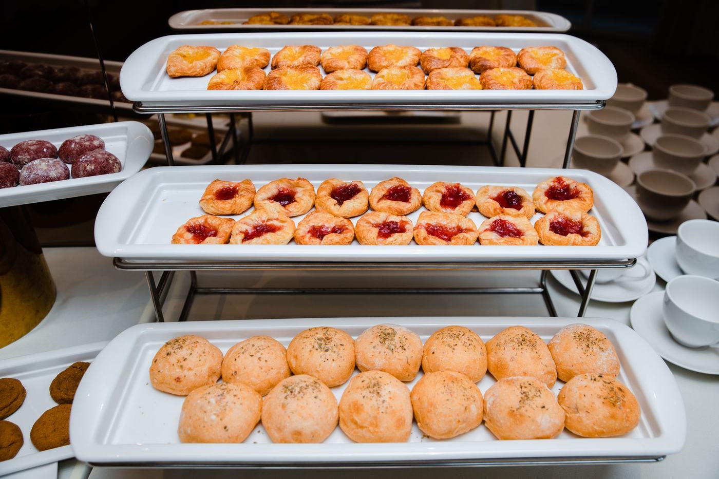 Delicious selection of pastries displayed at an indoor buffet event.